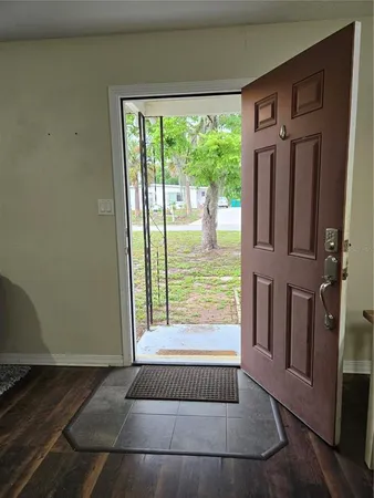 a view of water heater room with staircase