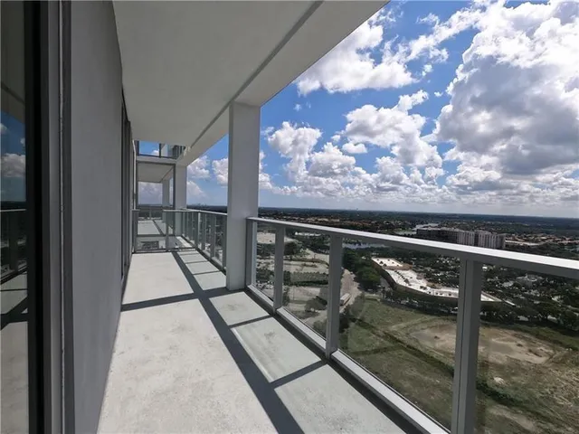 a room with furniture and a rug