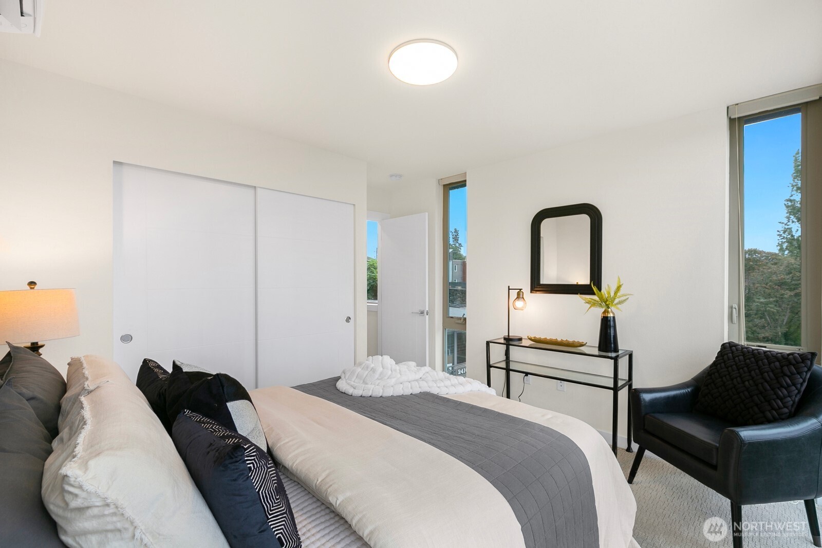 2408 13th Avenue South Seattle, WA 98144 - Photo 13 of 32 a bedroom with a bed and a dresser