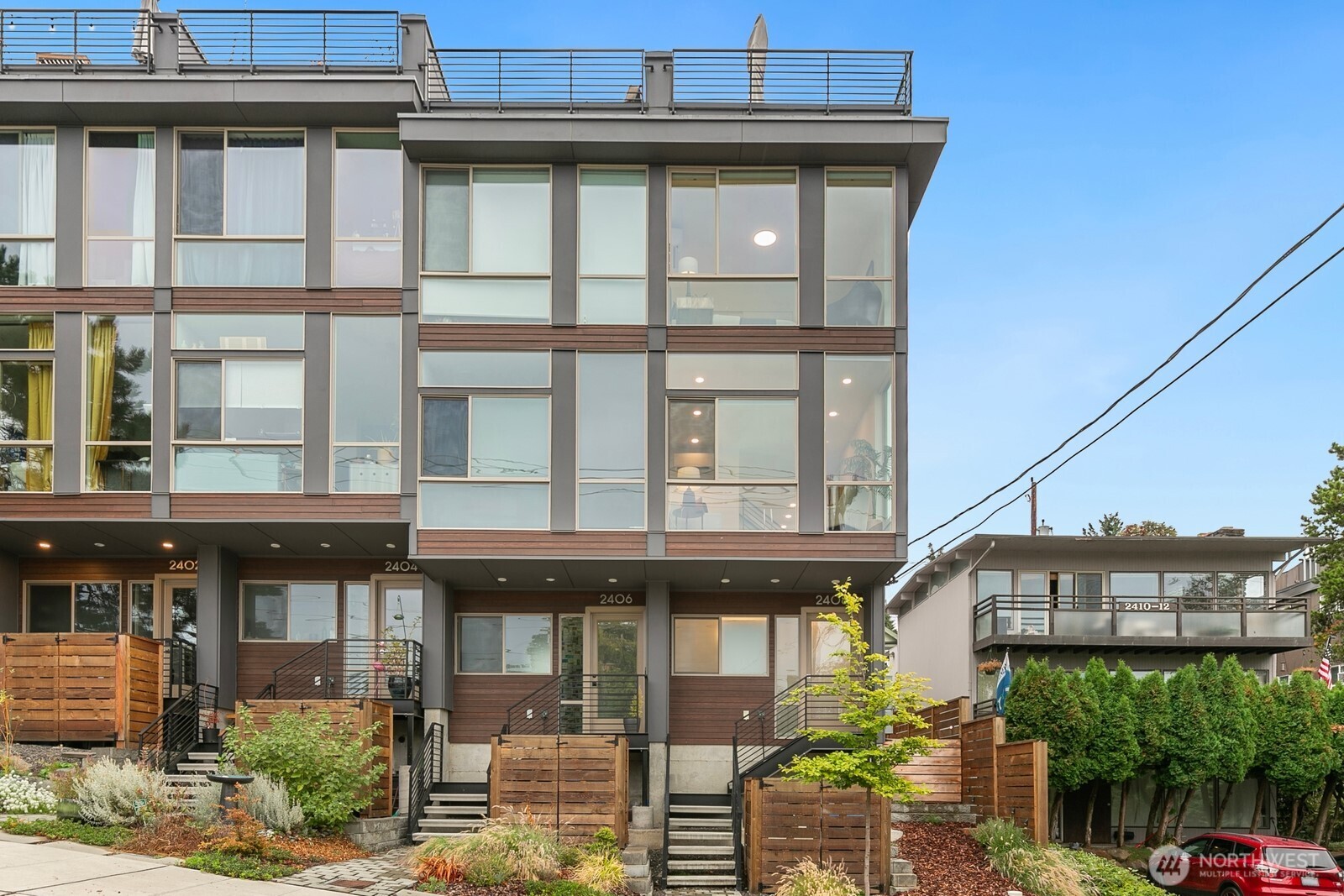 2408 13th Avenue South Seattle, WA 98144 - Photo 2 of 32 a front view of a building with balcony