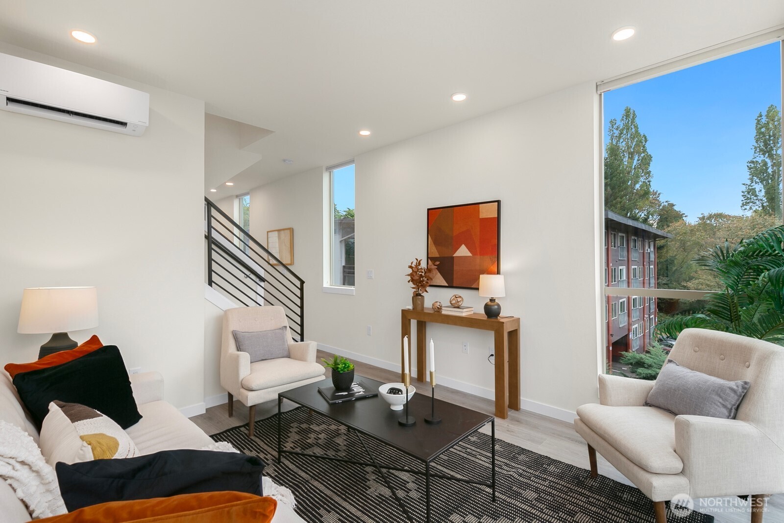 2408 13th Avenue South Seattle, WA 98144 - Photo 6 of 32 a living room with furniture and a flat screen tv