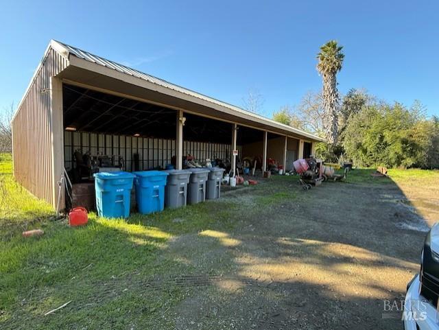 9415 Stevenson Bridge Road Winters, CA 95694 - Photo 10 of 15 a view of a backyard with plants and a patio