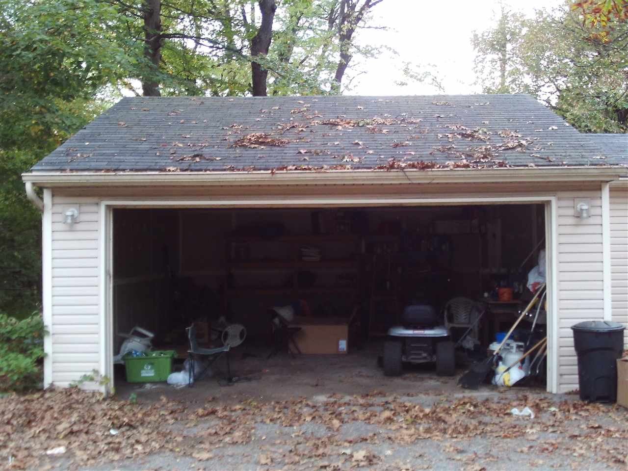 21469 Greenview Road Southfield, MI 48075 - Photo 12 of 19 This two car garage is in great shape, and features an automatic opener and built-in shelving along the back wall - perfect for a handyperson's workspace!