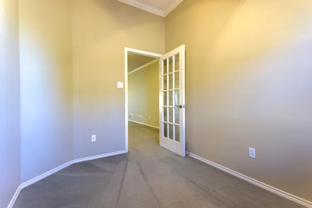 a bathroom with a shower sink and mirror