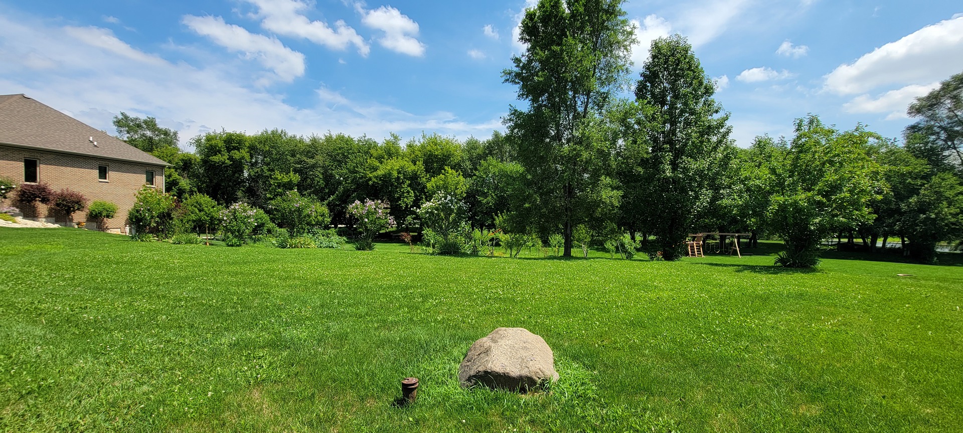 3059 Longcommon Parkway Elgin, IL 60124 - Photo 3 of 13 a view of a garden with trees
