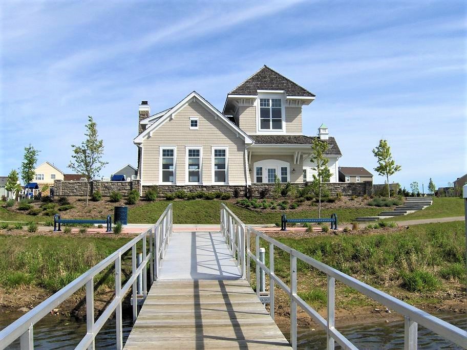 3059 Longcommon Parkway Elgin, IL 60124 - Photo 10 of 13 a view of a house with a porch