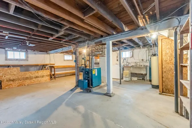 a view of an empty room with wooden roof