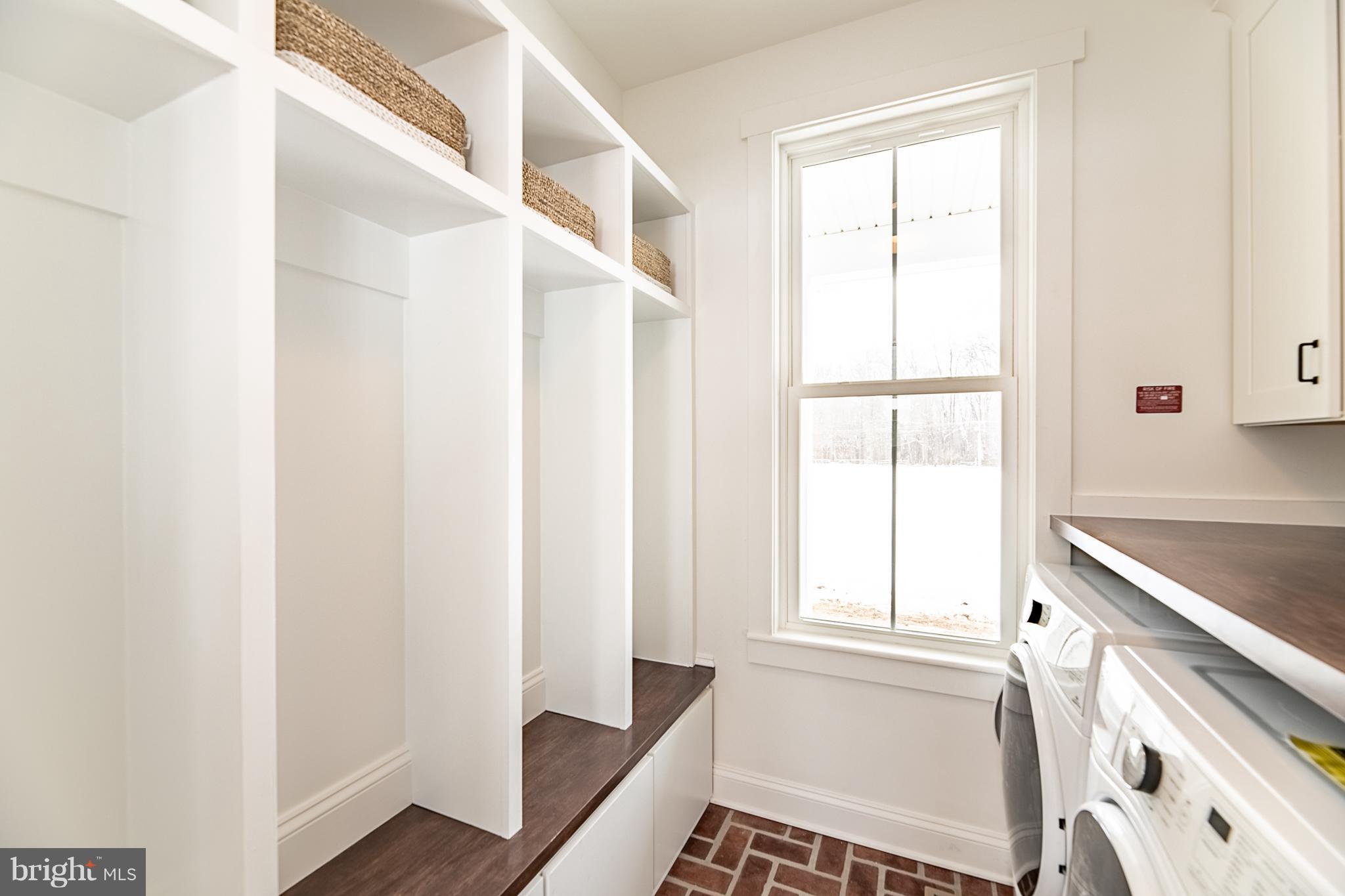 13762 Taylorstown Road Leesburg, VA 20176 - Photo 23 of 36 Laundry room cubbies - tons of storage space!