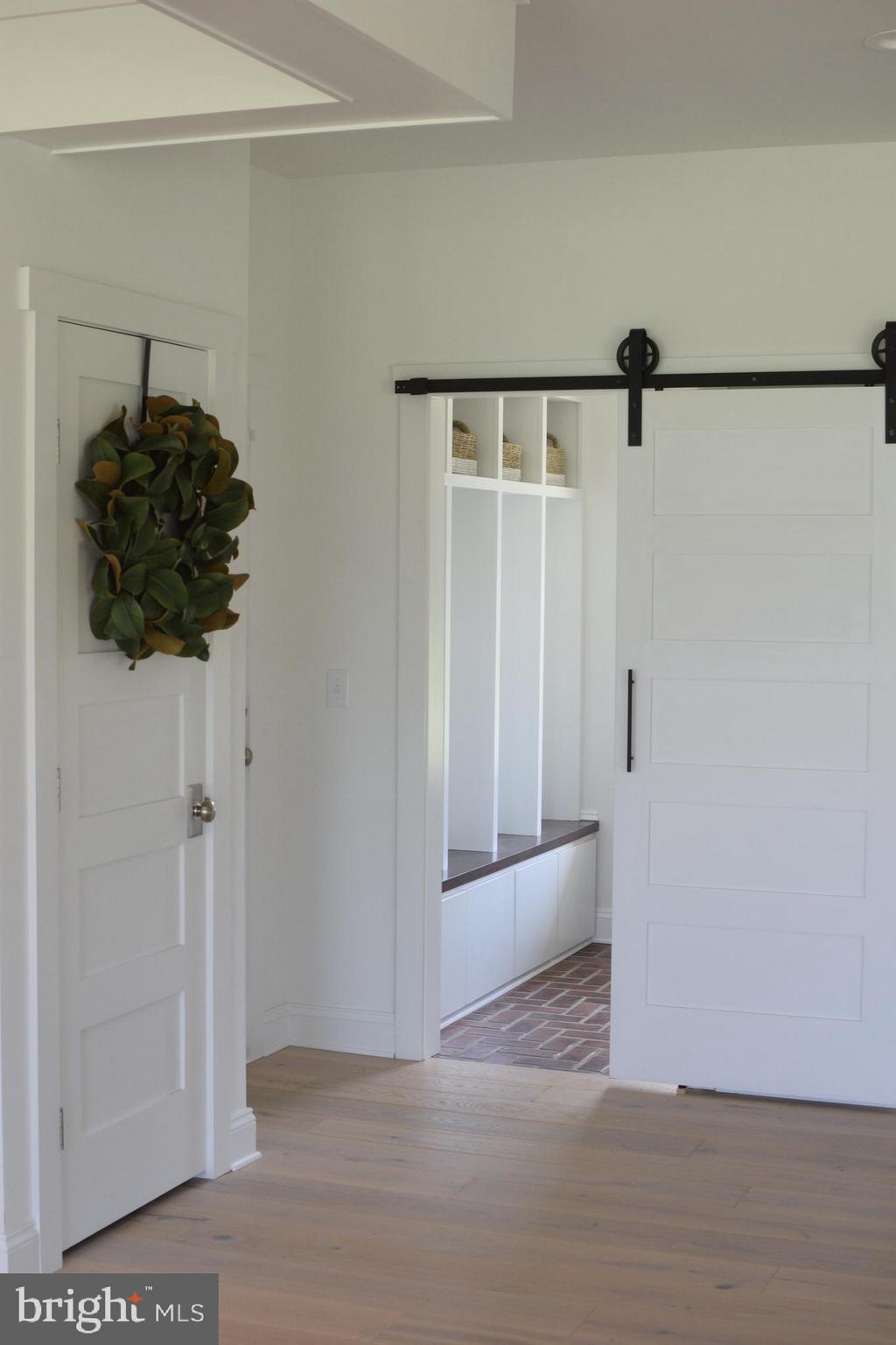 13762 Taylorstown Road Leesburg, VA 20176 - Photo 24 of 36 Sliding barn door to access laundry room