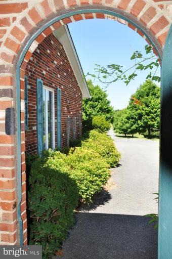 3600 Apple Pie Ridge Road Winchester, VA 22603 - Photo 10 of 30 Archway between front drive and rear patio