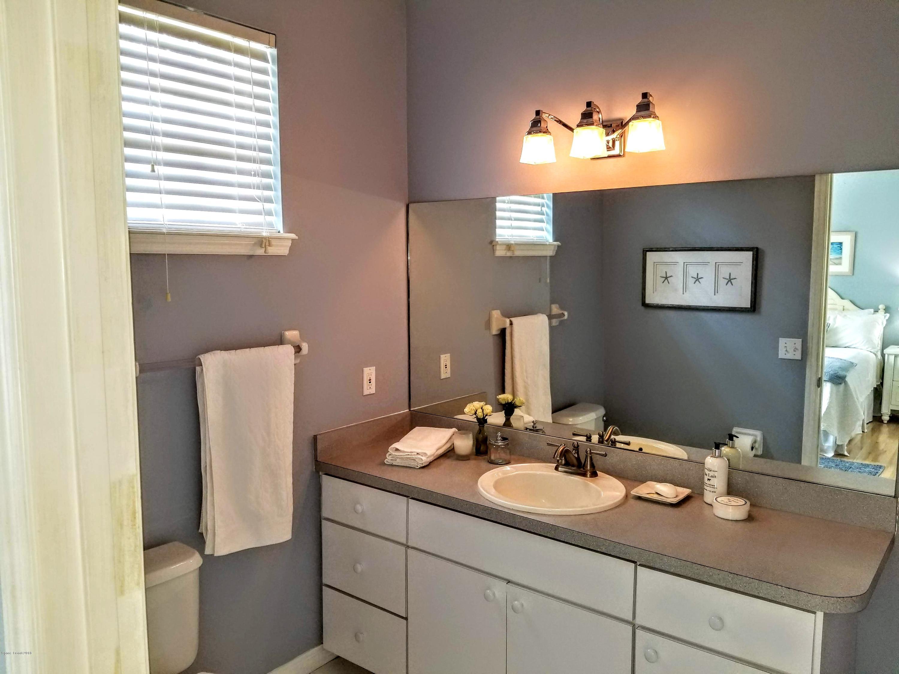 5850 North Wickham Road Melbourne, FL 32940 - Photo 17 of 36 Wick master bath