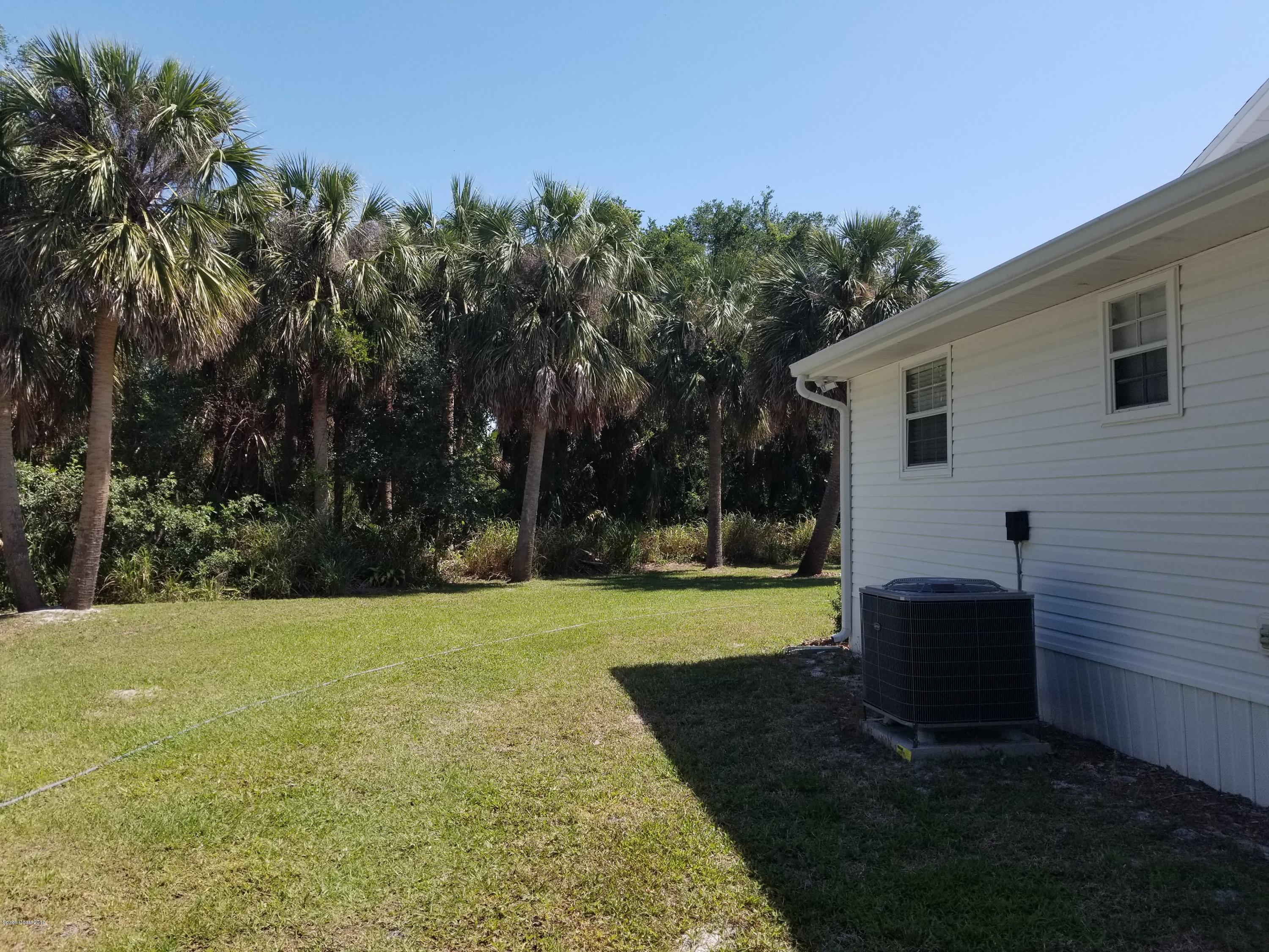 5850 North Wickham Road Melbourne, FL 32940 - Photo 24 of 36 Wickham back