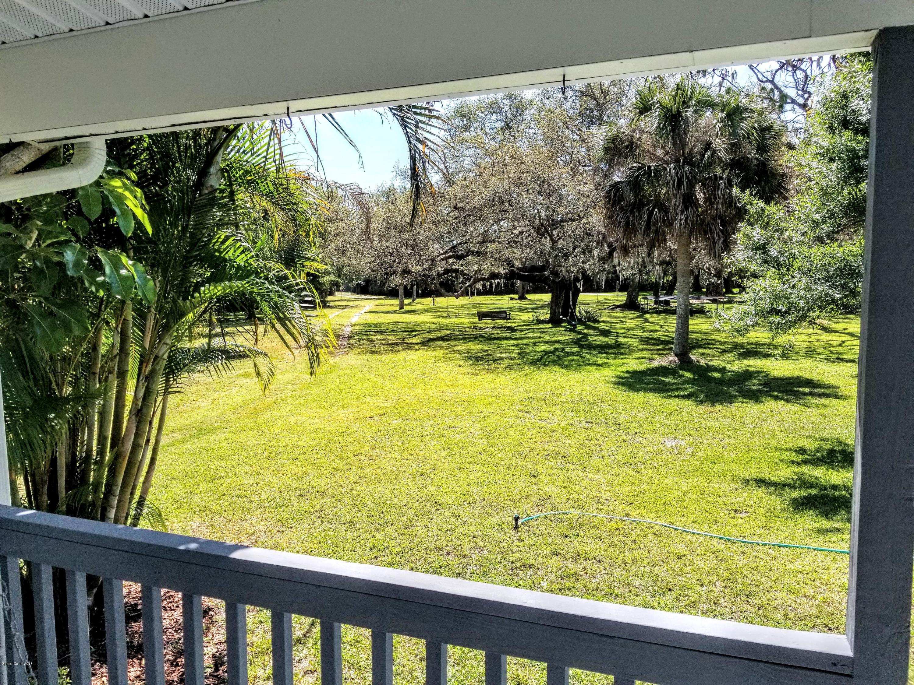 5850 North Wickham Road Melbourne, FL 32940 - Photo 27 of 36 Wickham front porch view
