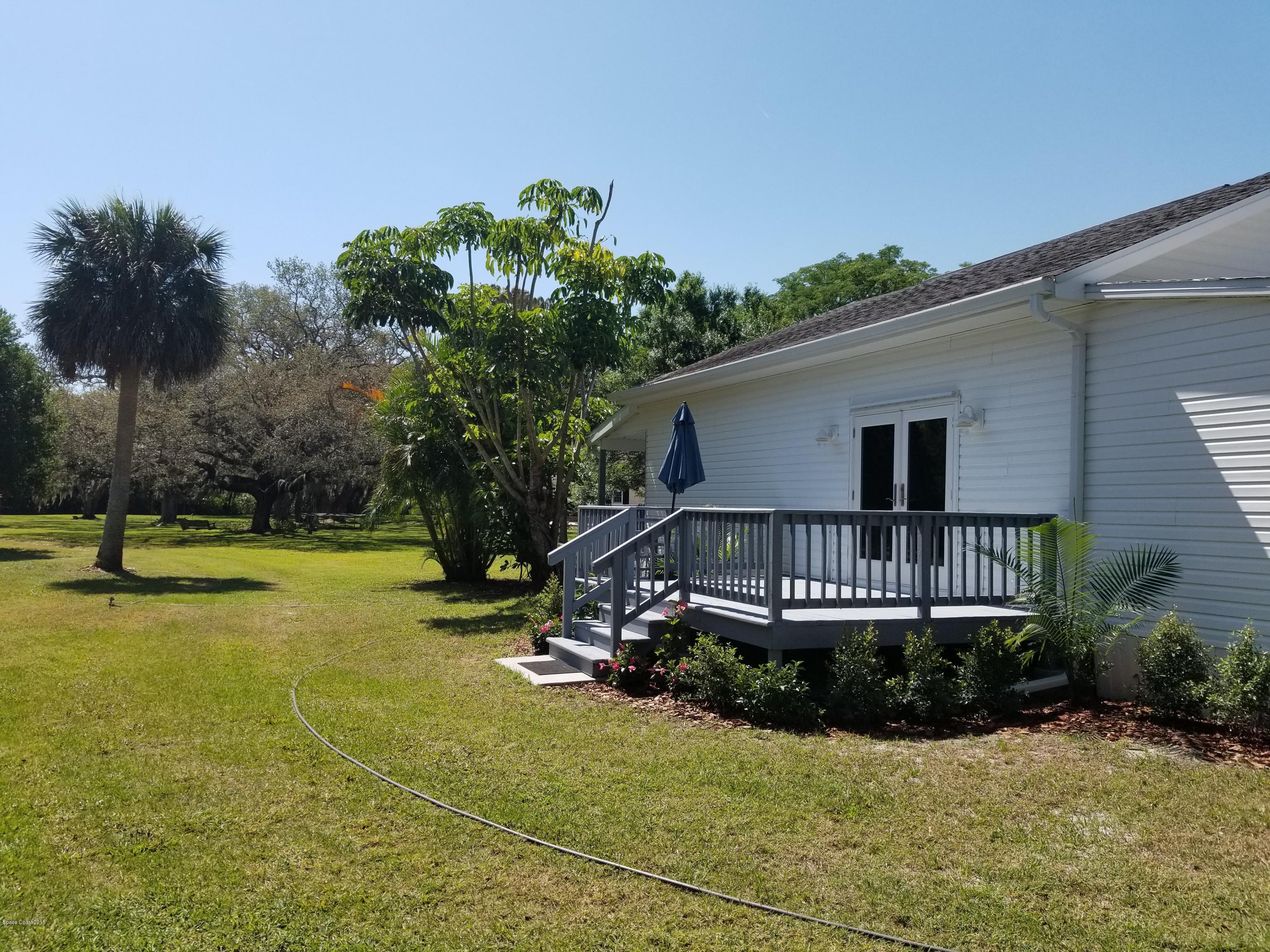 5850 North Wickham Road Melbourne, FL 32940 - Photo 35 of 36 Wickham ne porch