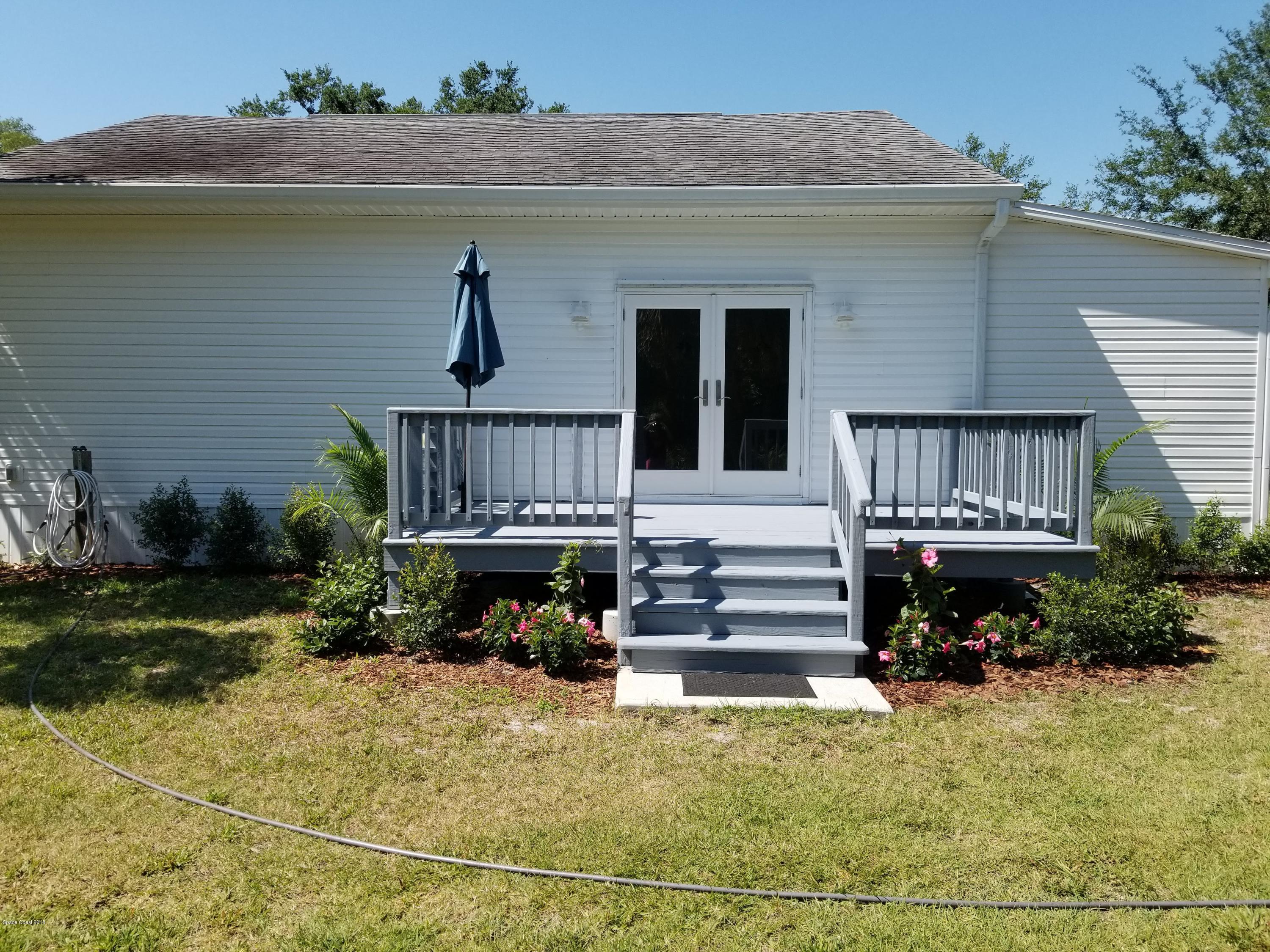5850 North Wickham Road Melbourne, FL 32940 - Photo 36 of 36 Wickham ne porch 2