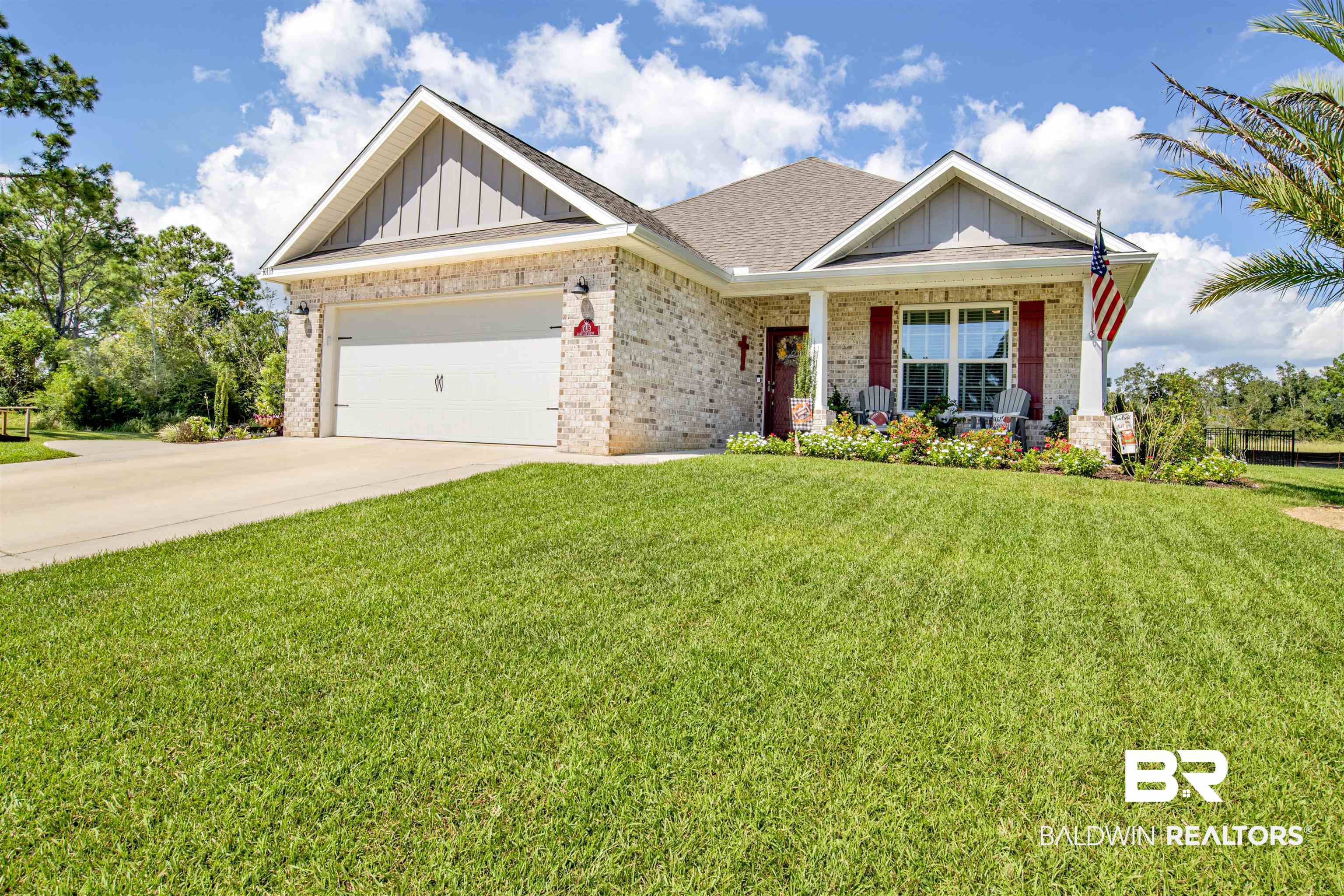 10113 Lakeview Drive Foley, AL 36535 - Photo 2 of 34 Craftsman-style home featuring a garage and a front yard