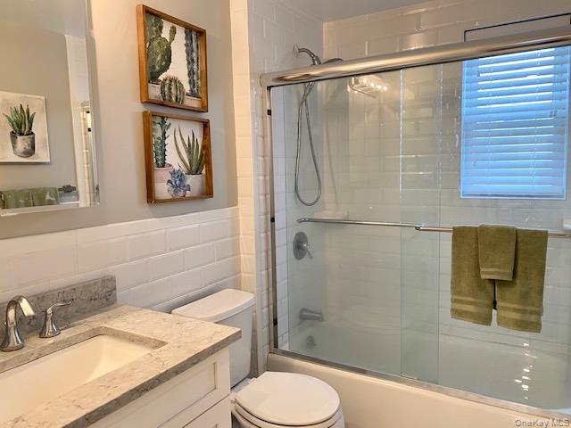 420 Terrace Road, Unit T10420 Bayport, NY 11705 - Photo 9 of 9 a bathroom with a sink a toilet and shower