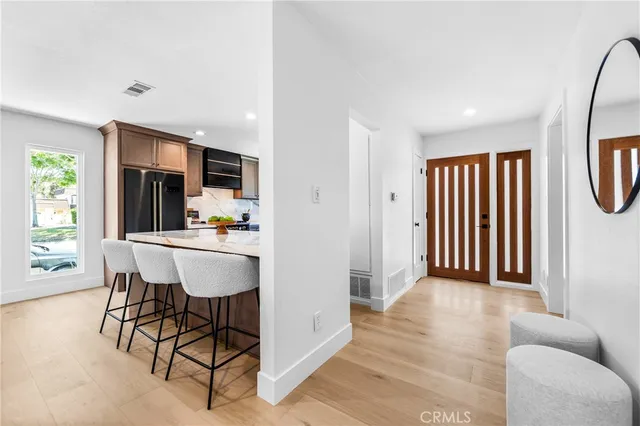 a view of a livingroom with furniture and window