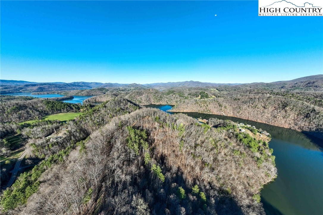 Lonesome Pine Trail Butler, TN 37640 - Photo 8 of 41 a view of a lake with mountains in the background