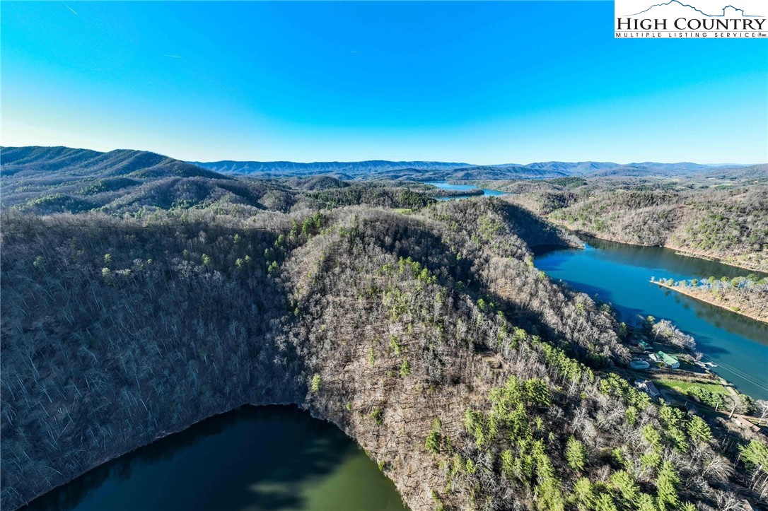 Lonesome Pine Trail Butler, TN 37640 - Photo 10 of 41 a view of a lake with a mountain