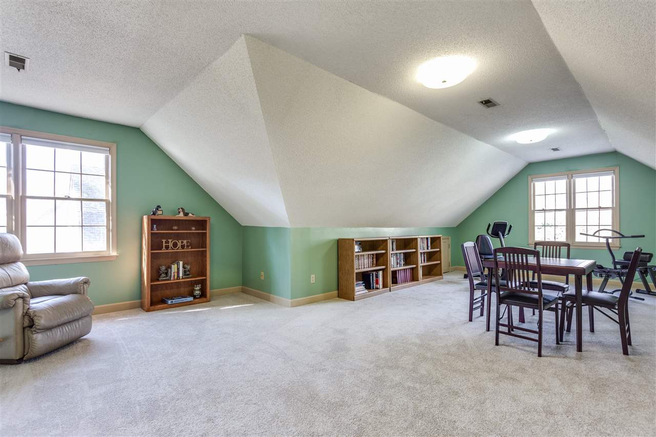 8108 Mourning Dove Road Raleigh, NC 27615 - Photo 21 of 25 HUGE BONUS ROOM WITH TONS OF EXTRA STORAGE! Bonus Room