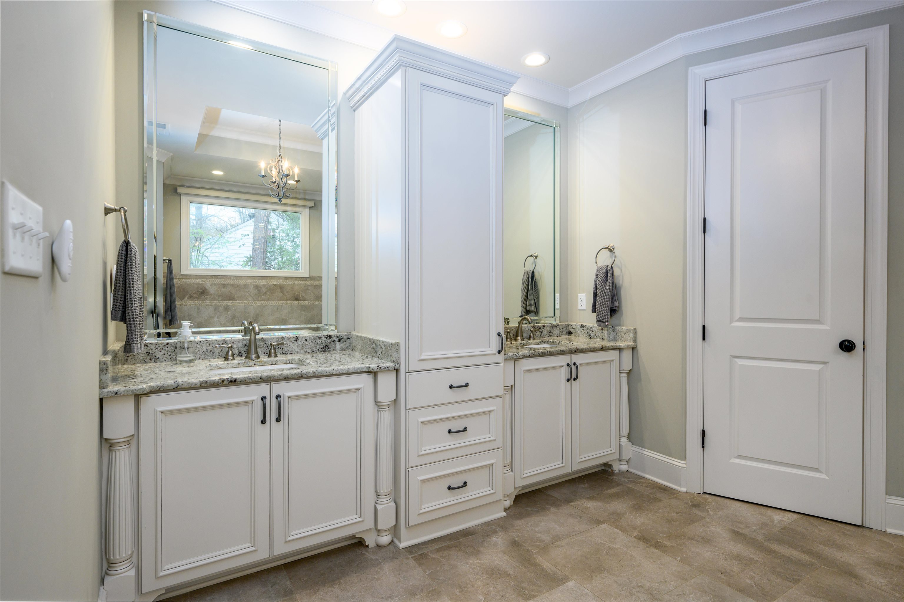 4980 Cole Road Memphis, TN 38117 - Photo 14 of 25 a bathroom with a granite countertop sink double and mirror