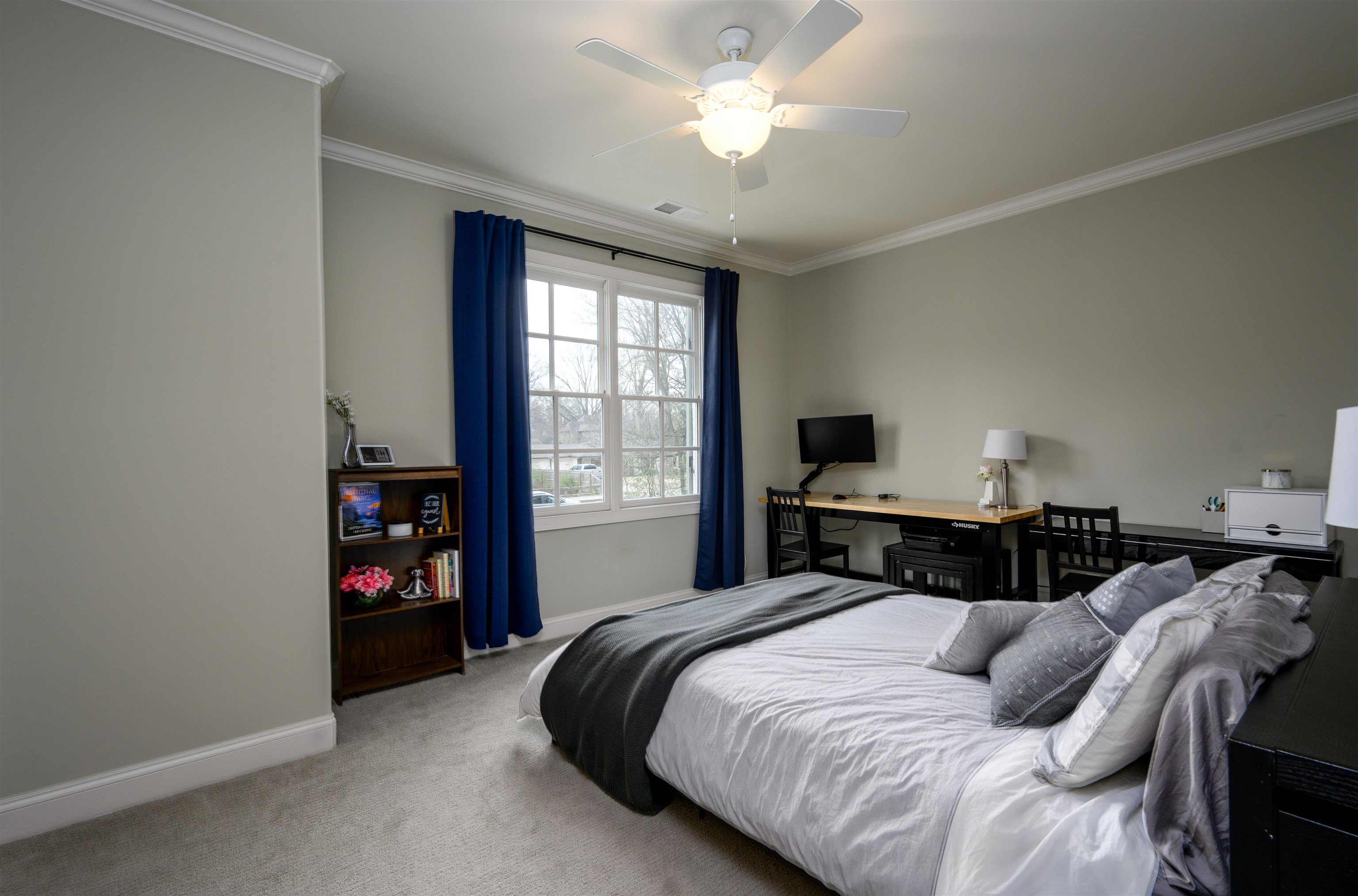 4980 Cole Road Memphis, TN 38117 - Photo 17 of 25 a bedroom with a bed and a window