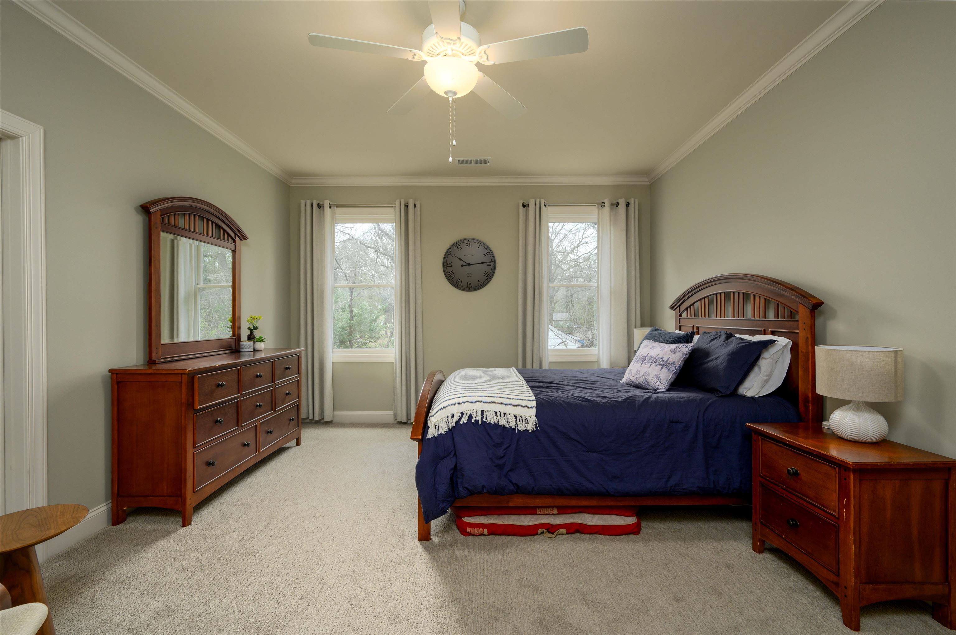 4980 Cole Road Memphis, TN 38117 - Photo 19 of 25 a bedroom with a bed and a chandelier