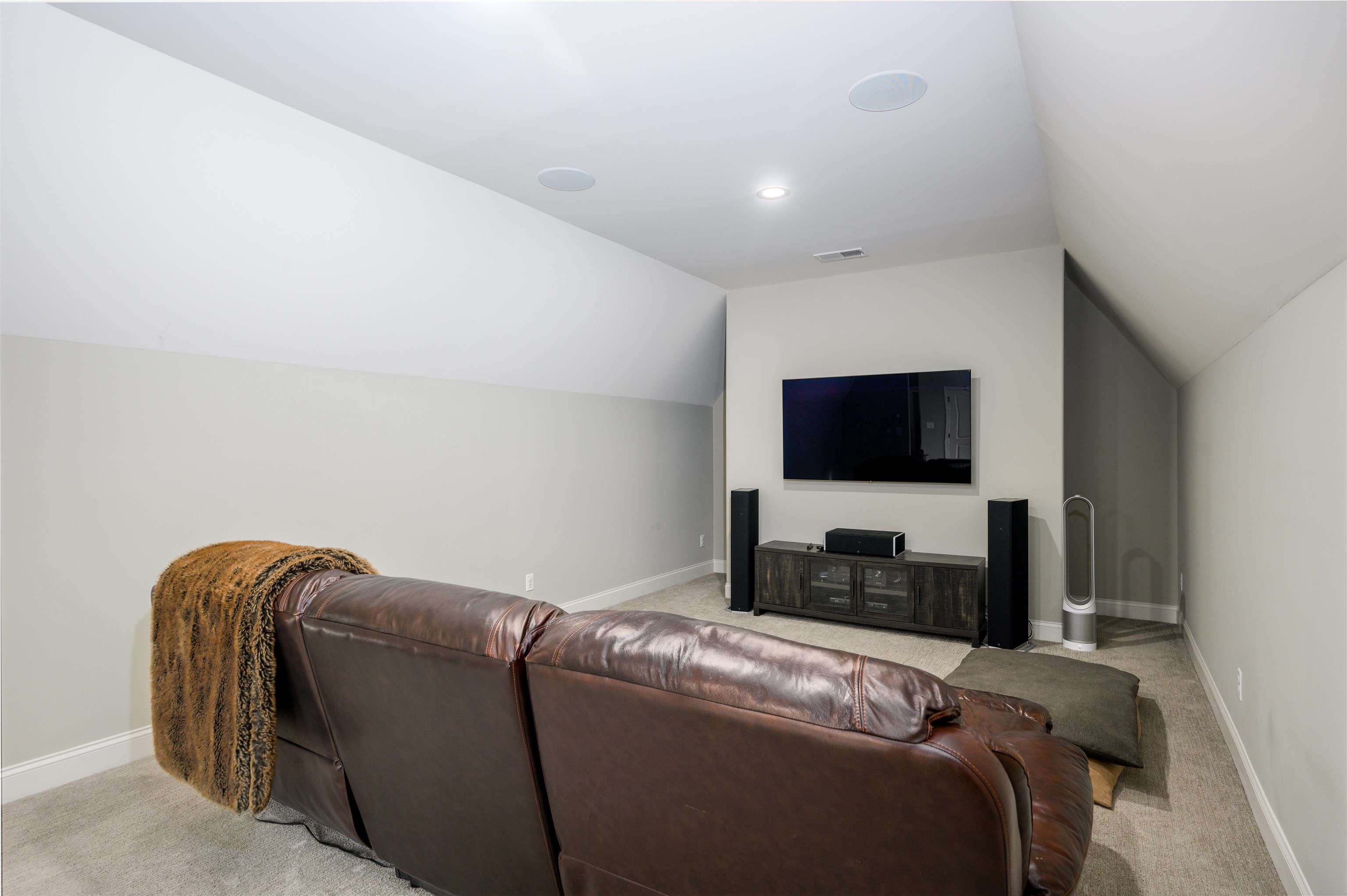 4980 Cole Road Memphis, TN 38117 - Photo 22 of 25 a living room with a bed and a flat screen tv