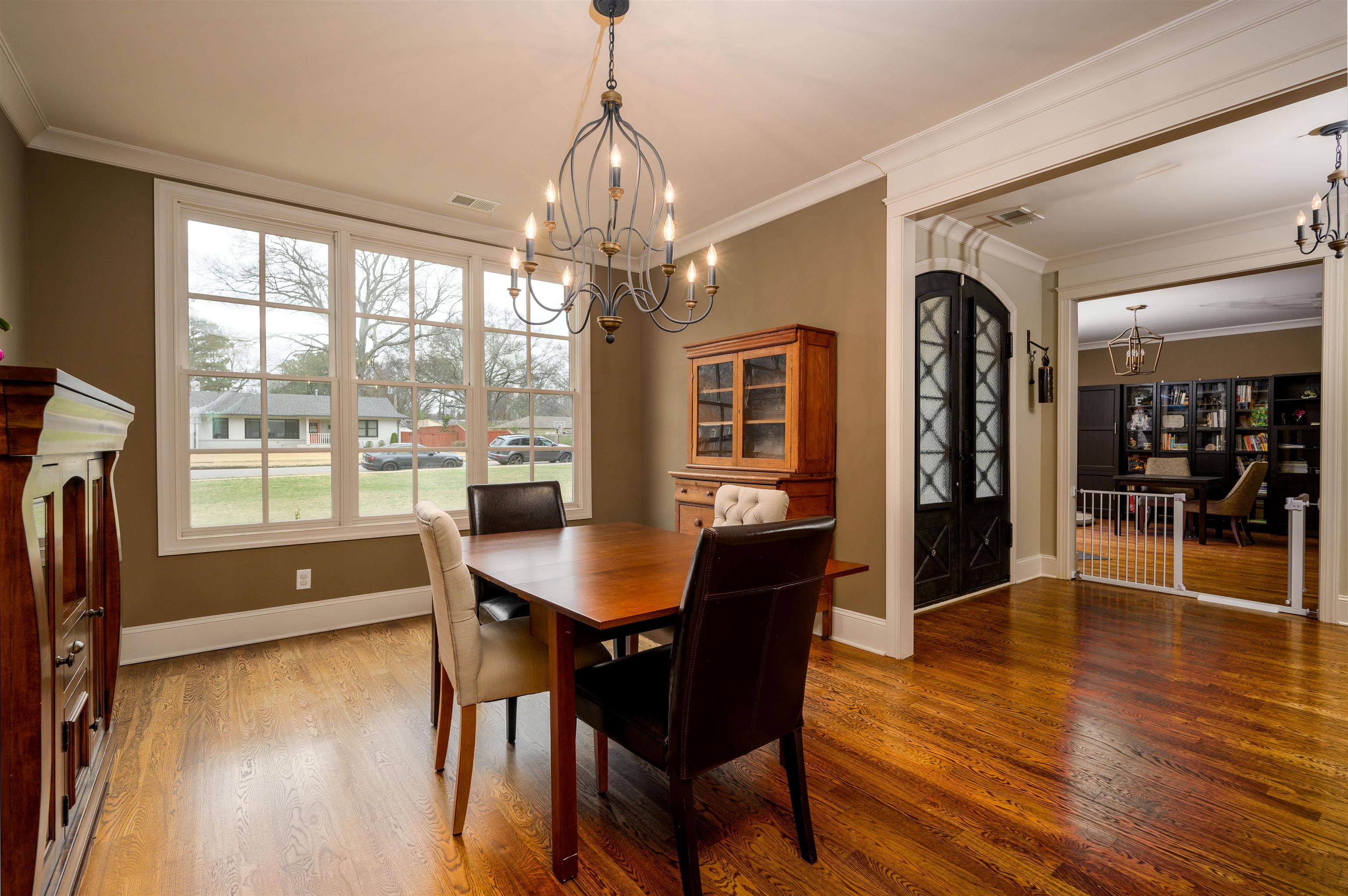 4980 Cole Road Memphis, TN 38117 - Photo 3 of 25 a view of a dining room with furniture window and wooden floor