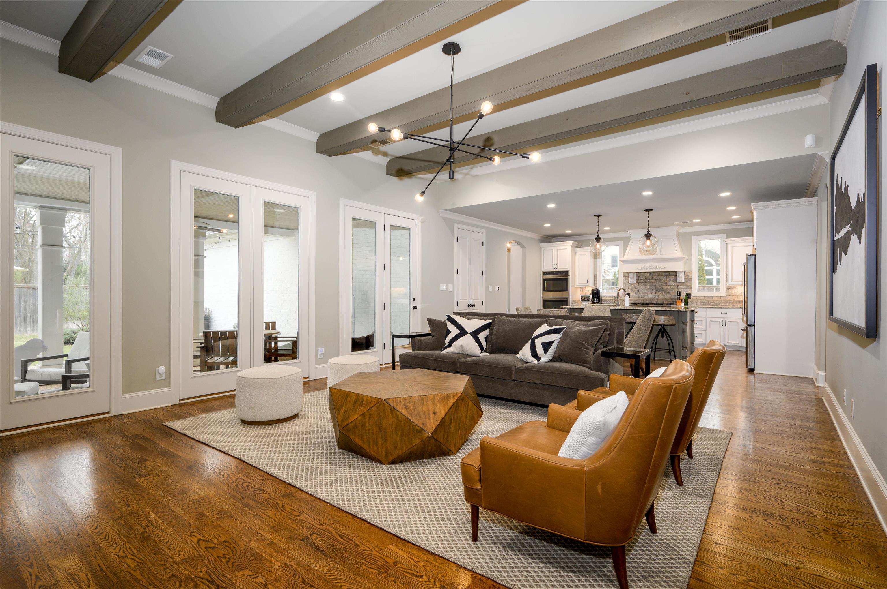 4980 Cole Road Memphis, TN 38117 - Photo 6 of 25 a living room with furniture and a chandelier