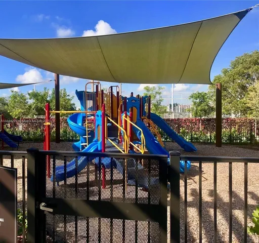 a view of a park with slide