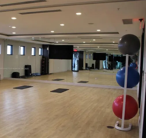 a view of a room with gym equipment