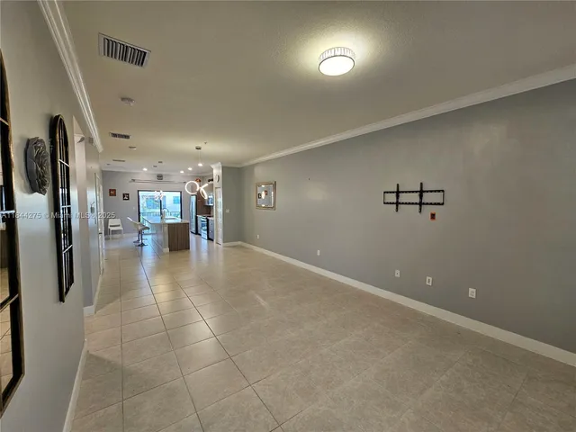 a view of a livingroom with a furniture