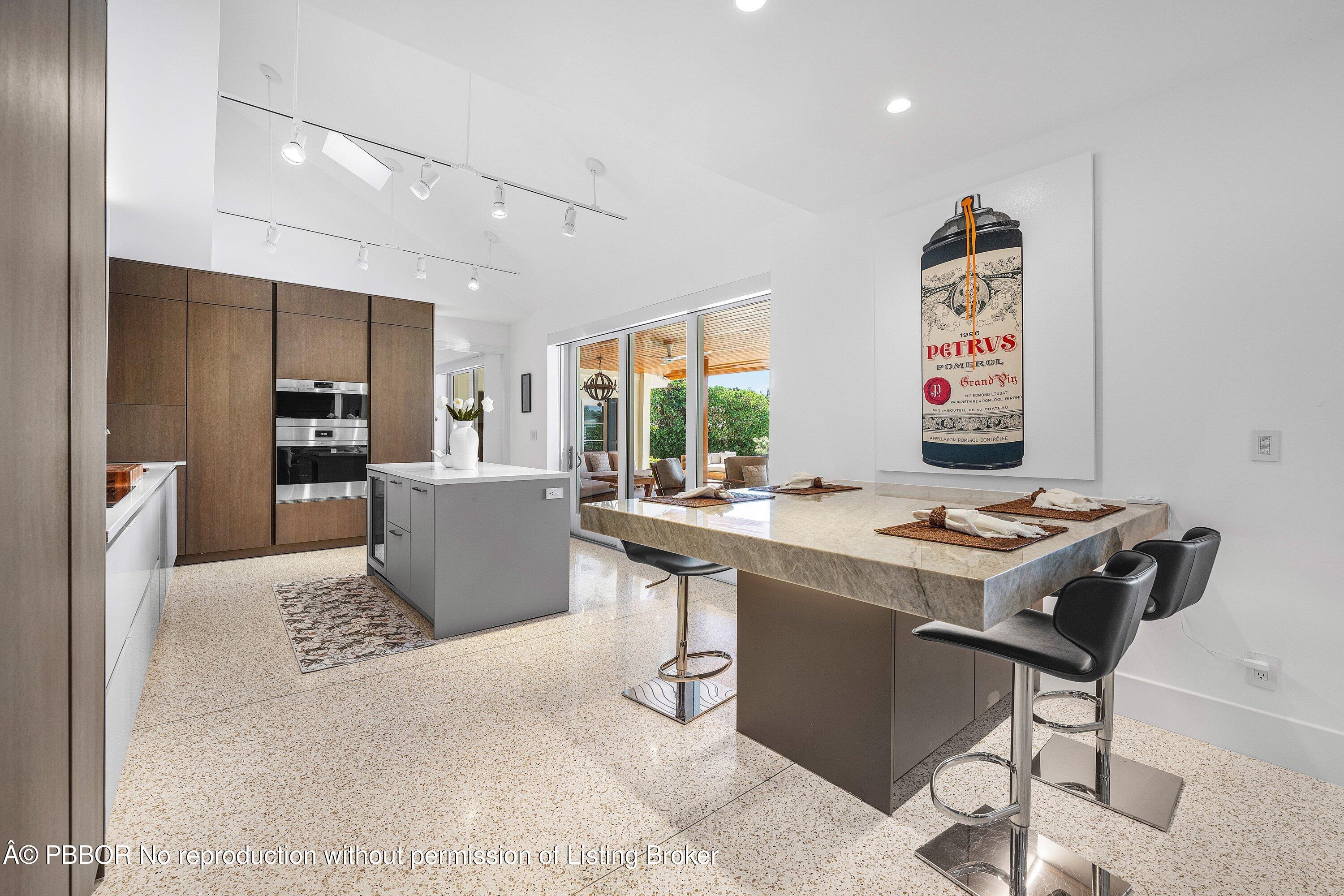 50 Spoonbill Road Lantana, FL 33462 - Photo 11 of 38 a living room with a couch and a table