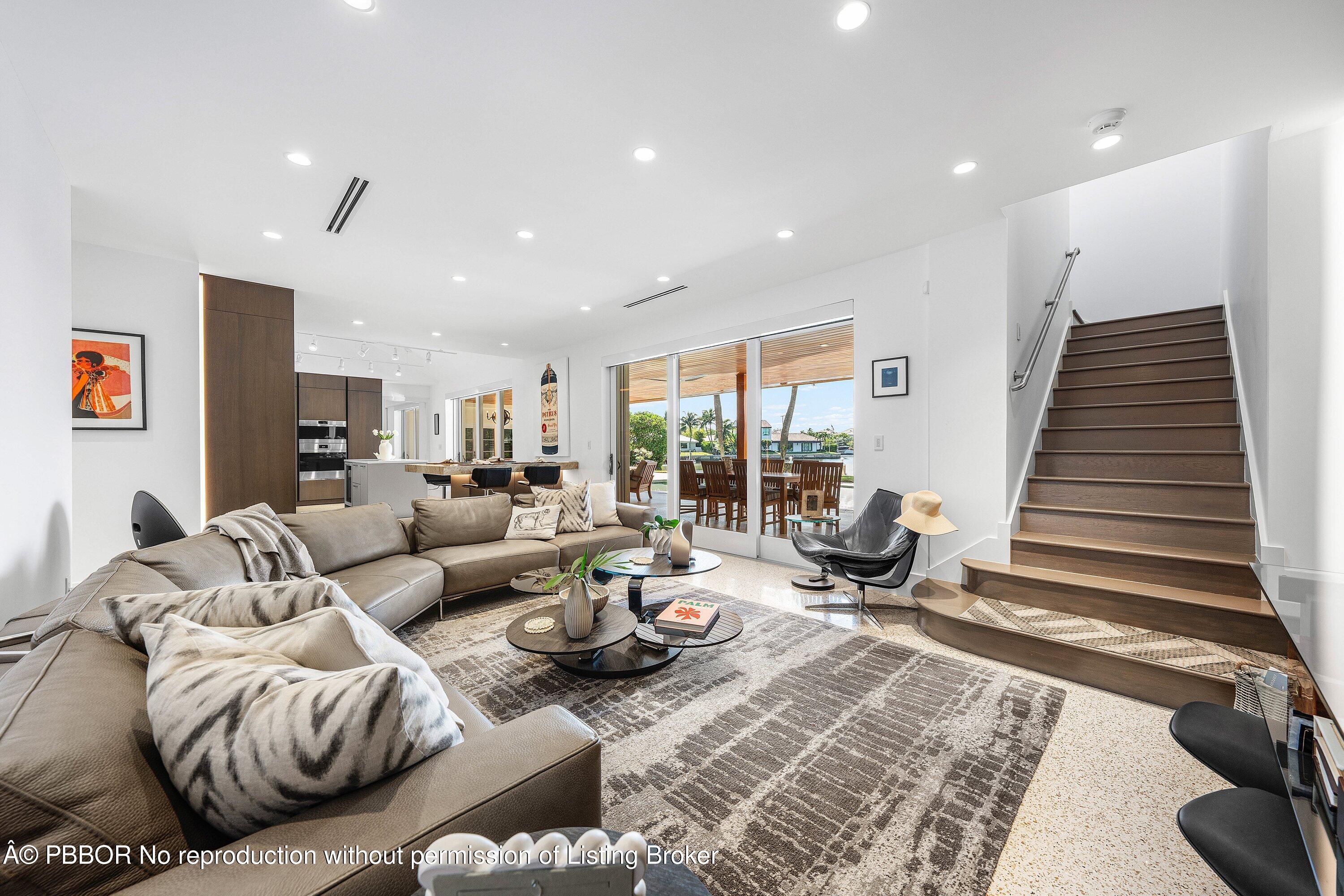 50 Spoonbill Road Lantana, FL 33462 - Photo 13 of 38 a living room with furniture or couch and a large window
