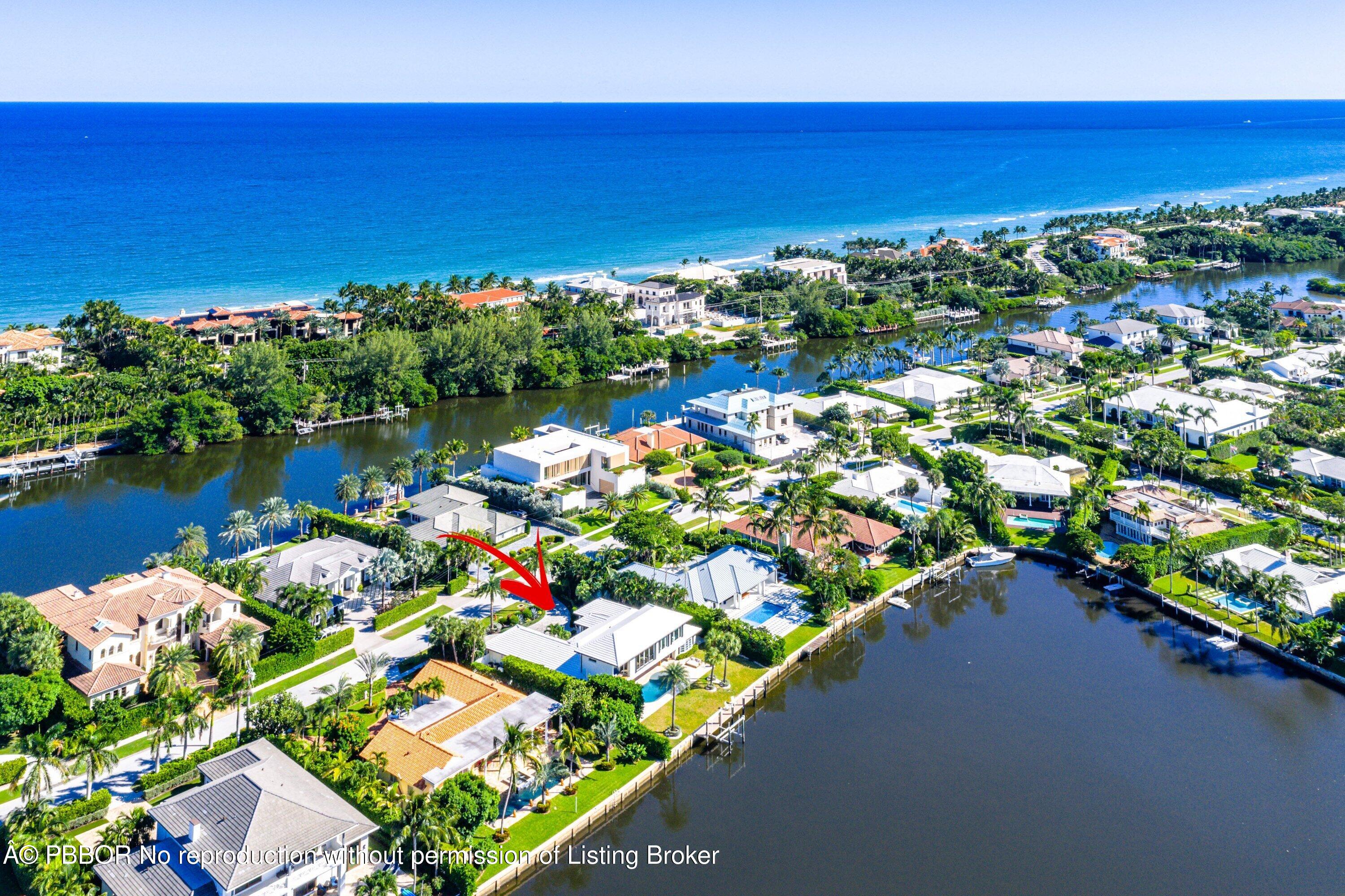 50 Spoonbill Road Lantana, FL 33462 - Photo 31 of 38 a view of a lake with a yard