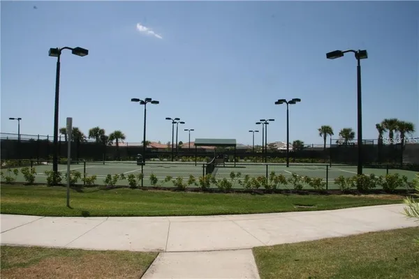 a view of a street with a park
