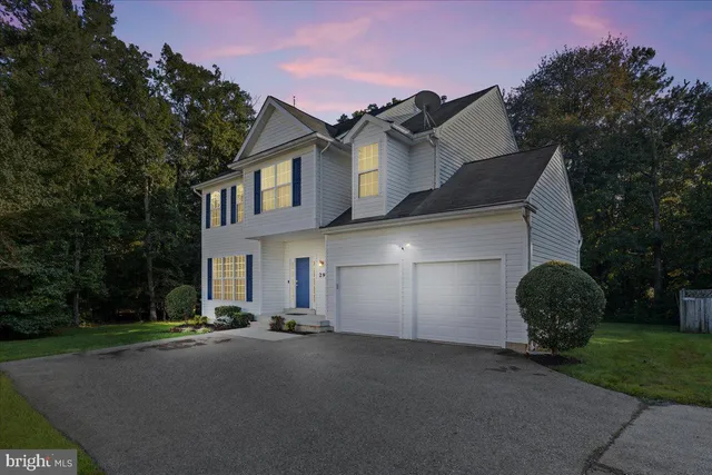 a view of a street with a house