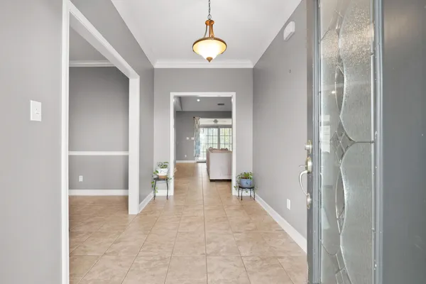 a kitchen with stainless steel appliances kitchen island granite countertop a sink and cabinets