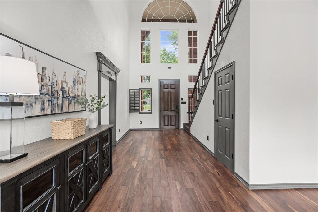 3091 Rockbridge Road McGregor, TX 76657 - Photo 7 of 40 a view of a hallway with wooden floor and staircase