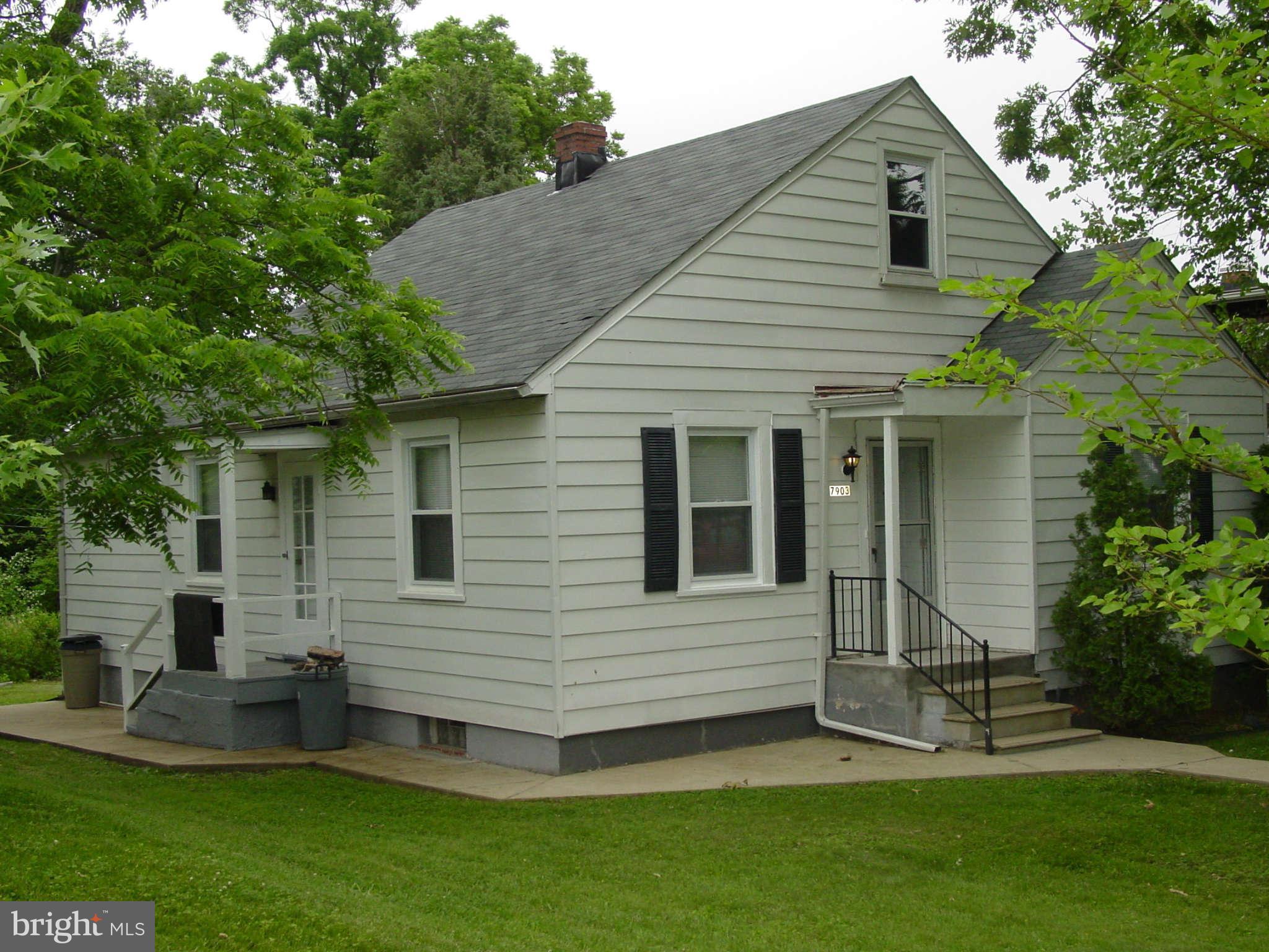 7903 Bon Air Road Baltimore, MD 21234 - Photo 2 of 17 a view of a house with a backyard
