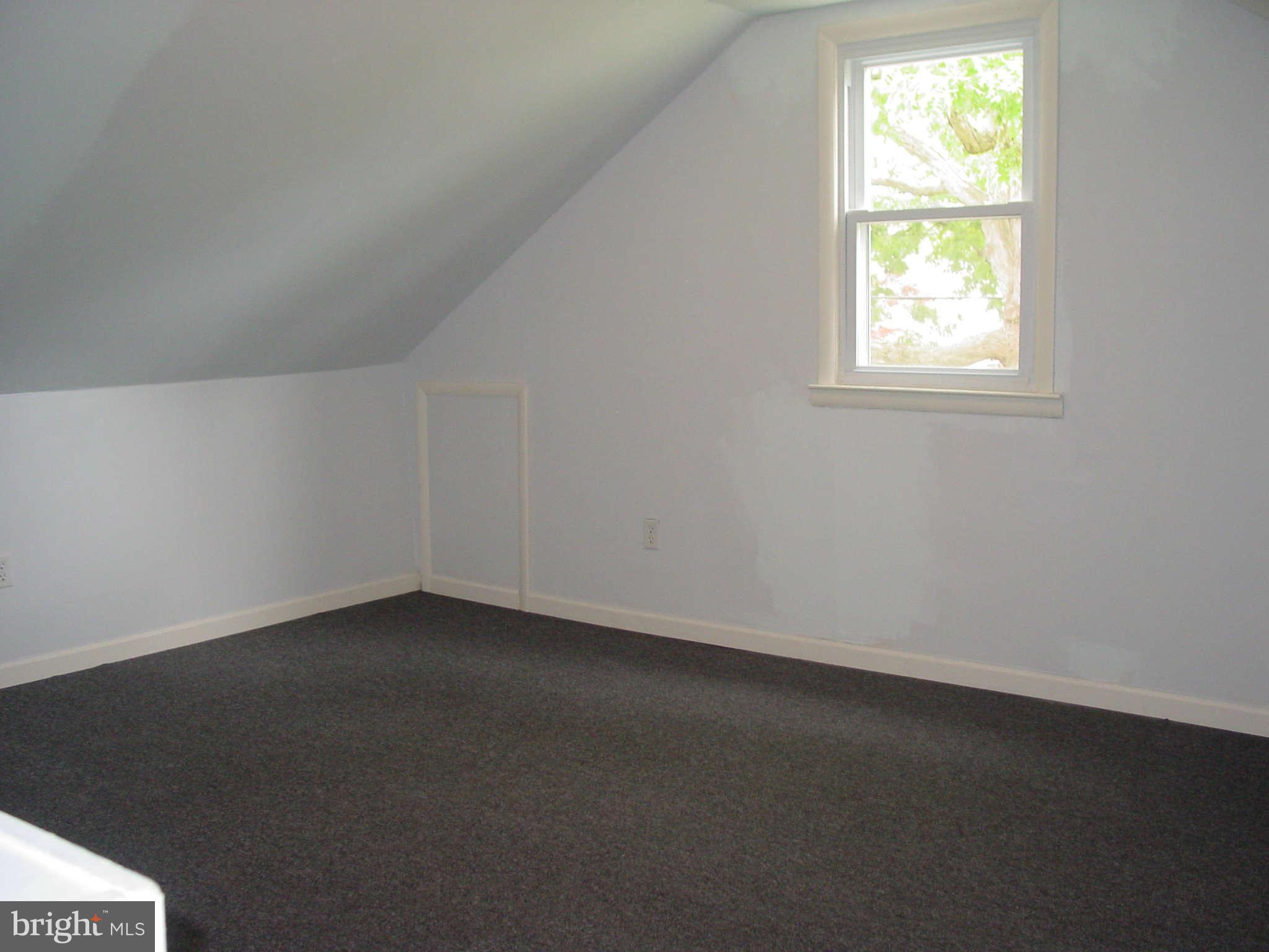 7903 Bon Air Road Baltimore, MD 21234 - Photo 12 of 17 an empty room with a window