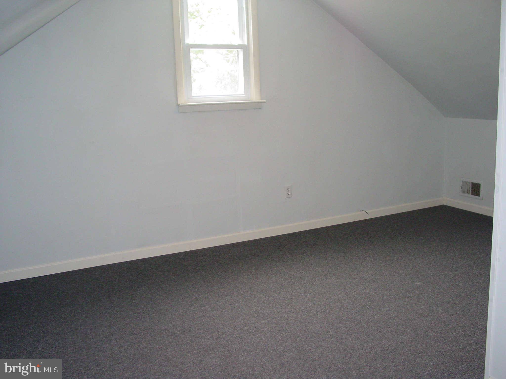 7903 Bon Air Road Baltimore, MD 21234 - Photo 13 of 17 an empty room with a window