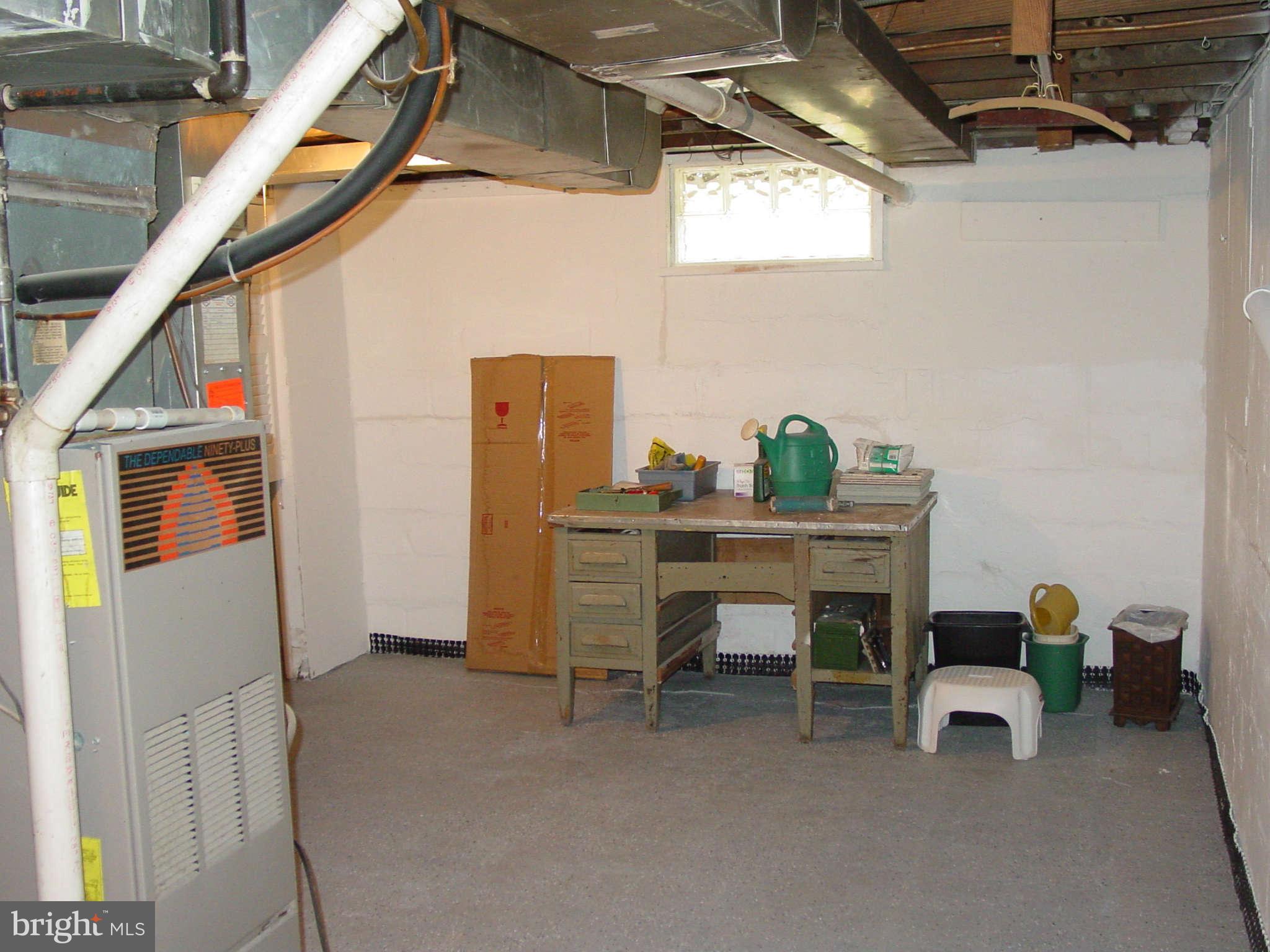 7903 Bon Air Road Baltimore, MD 21234 - Photo 14 of 17 a view of a workspace with furniture