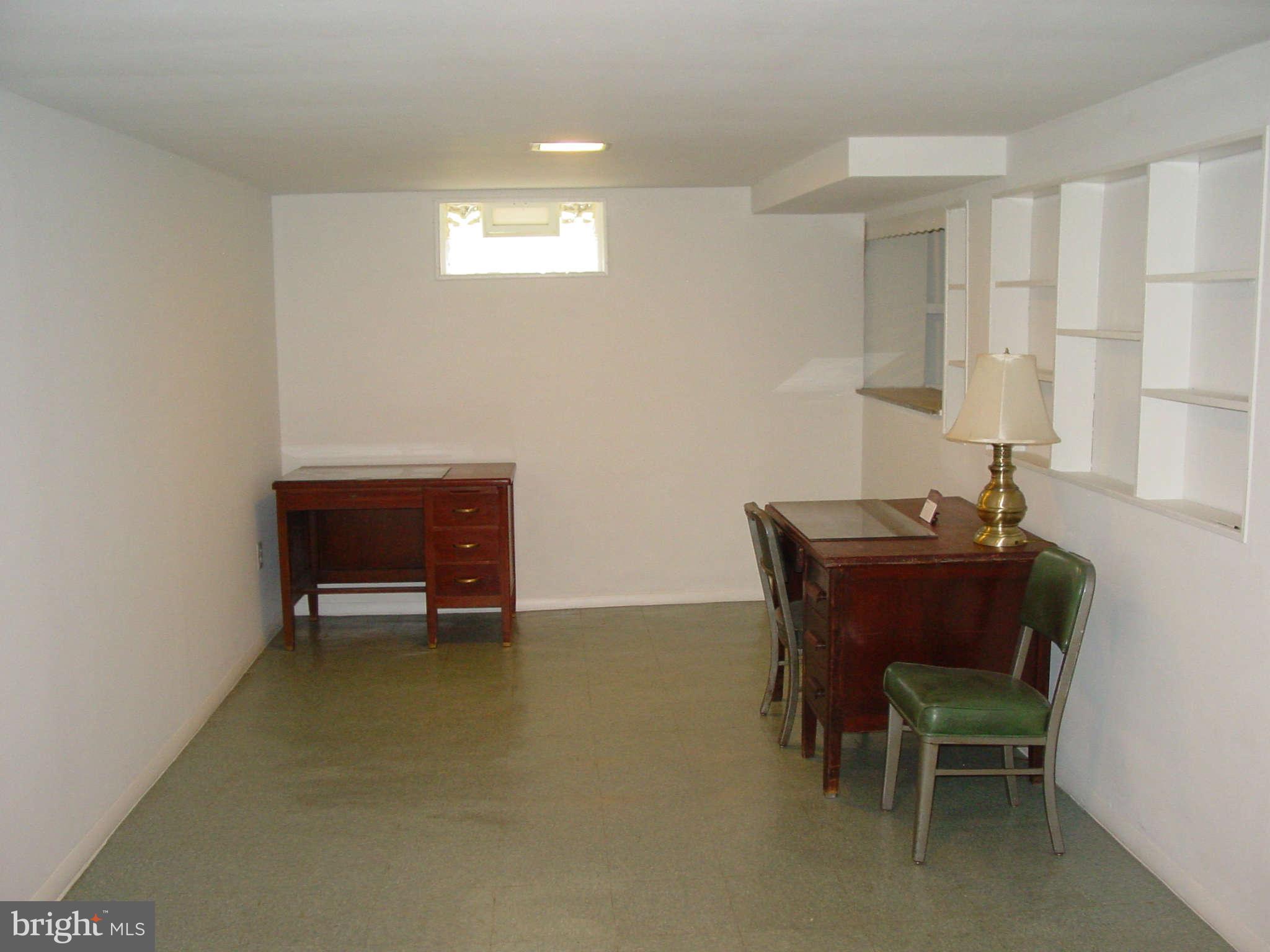 7903 Bon Air Road Baltimore, MD 21234 - Photo 15 of 17 a workspace with furniture and window