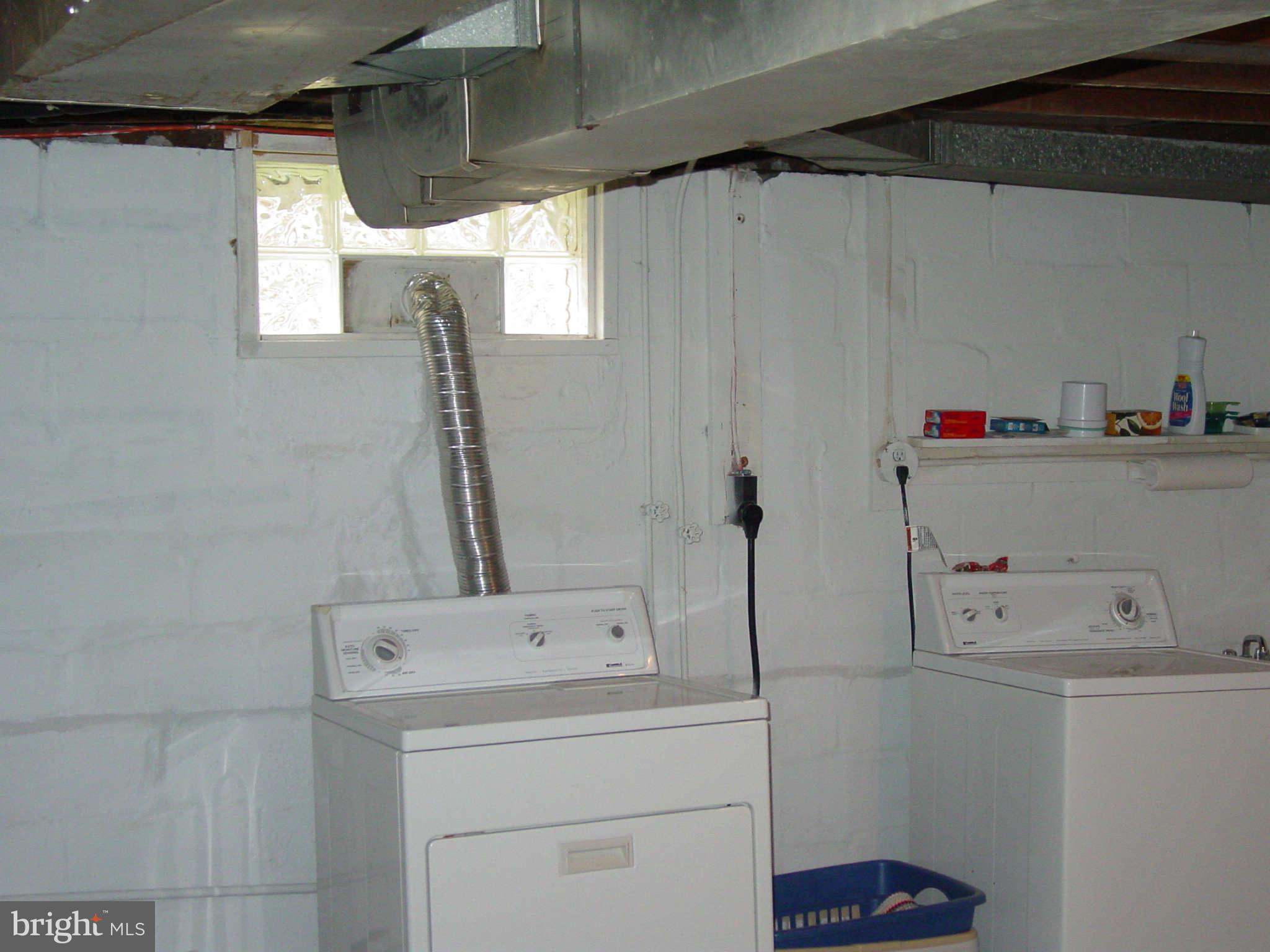 7903 Bon Air Road Baltimore, MD 21234 - Photo 16 of 17 a utility room with dryer and washer