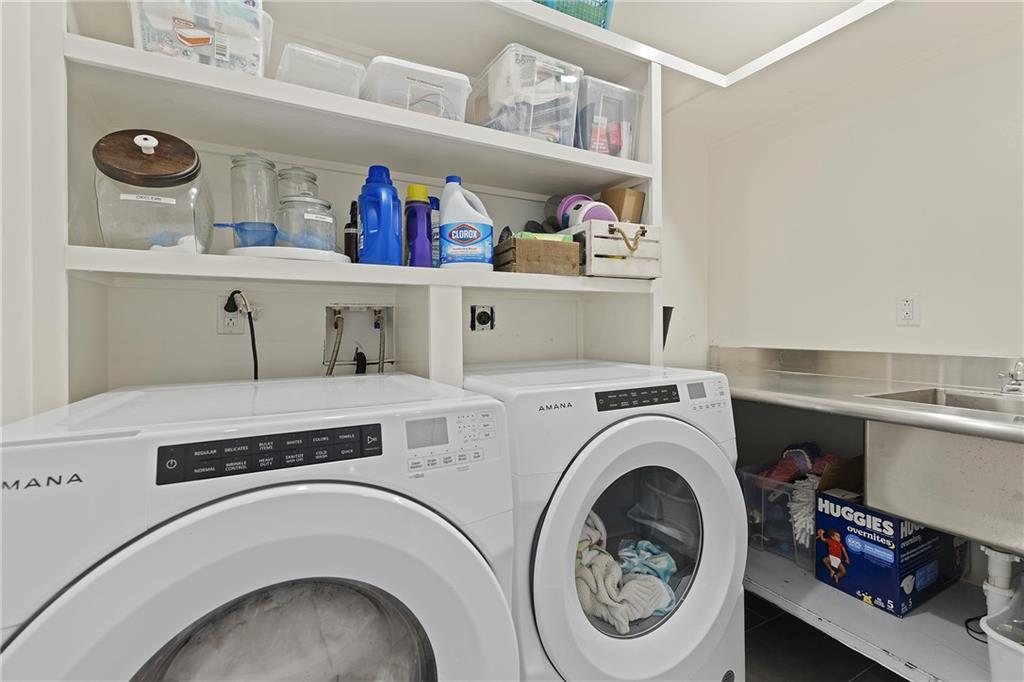 103 Main Street Ambridge, PA 15003 - Photo 19 of 49 a utility room with dryer and washer