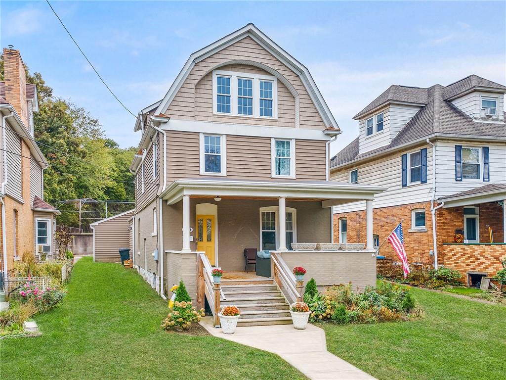 103 Main Street Ambridge, PA 15003 - Photo 2 of 49 a front view of a house with a yard