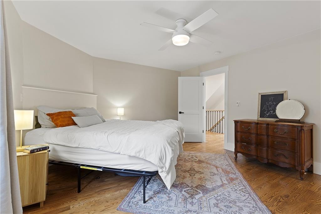 103 Main Street Ambridge, PA 15003 - Photo 23 of 49 a bedroom with a bed and a dresser